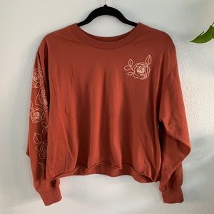 pinkish red shirt with embroidered front rose